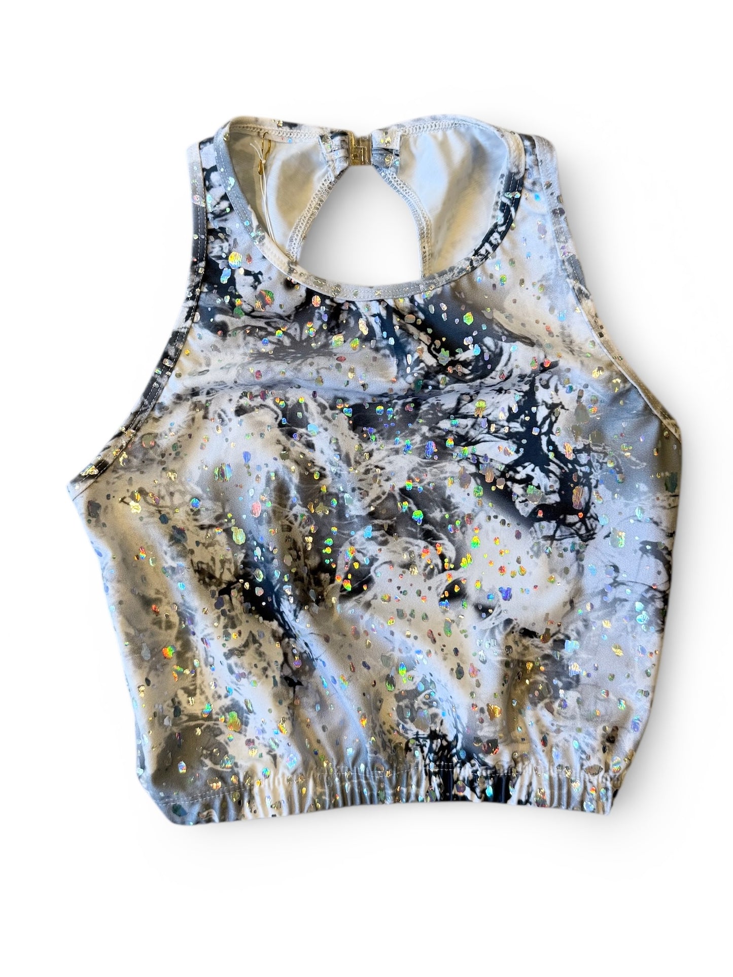 Top med åben ryg. Grålig glimmer. Str. 12 år.